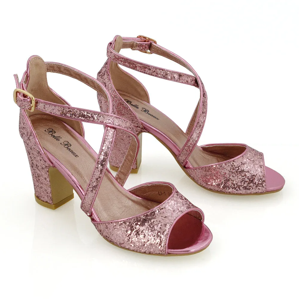 HARLOW CROSS OVER STRAPPY BUCKLE PEEP TOE BLOCK HIGH HEELS IN PINK GLITTER