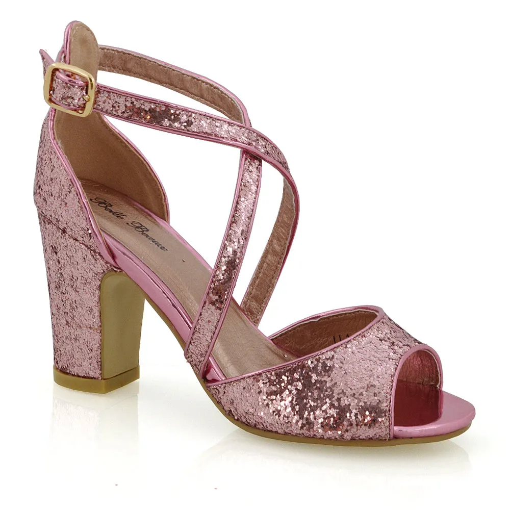 HARLOW CROSS OVER STRAPPY BUCKLE PEEP TOE BLOCK HIGH HEELS IN PINK GLITTER